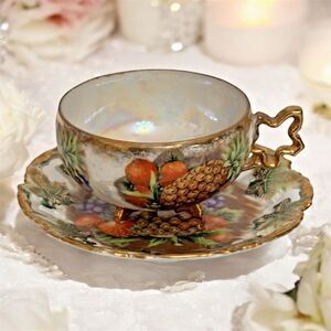 Royal Sealy Pearlized Fruit Motif 3-Toed Cup & Saucer